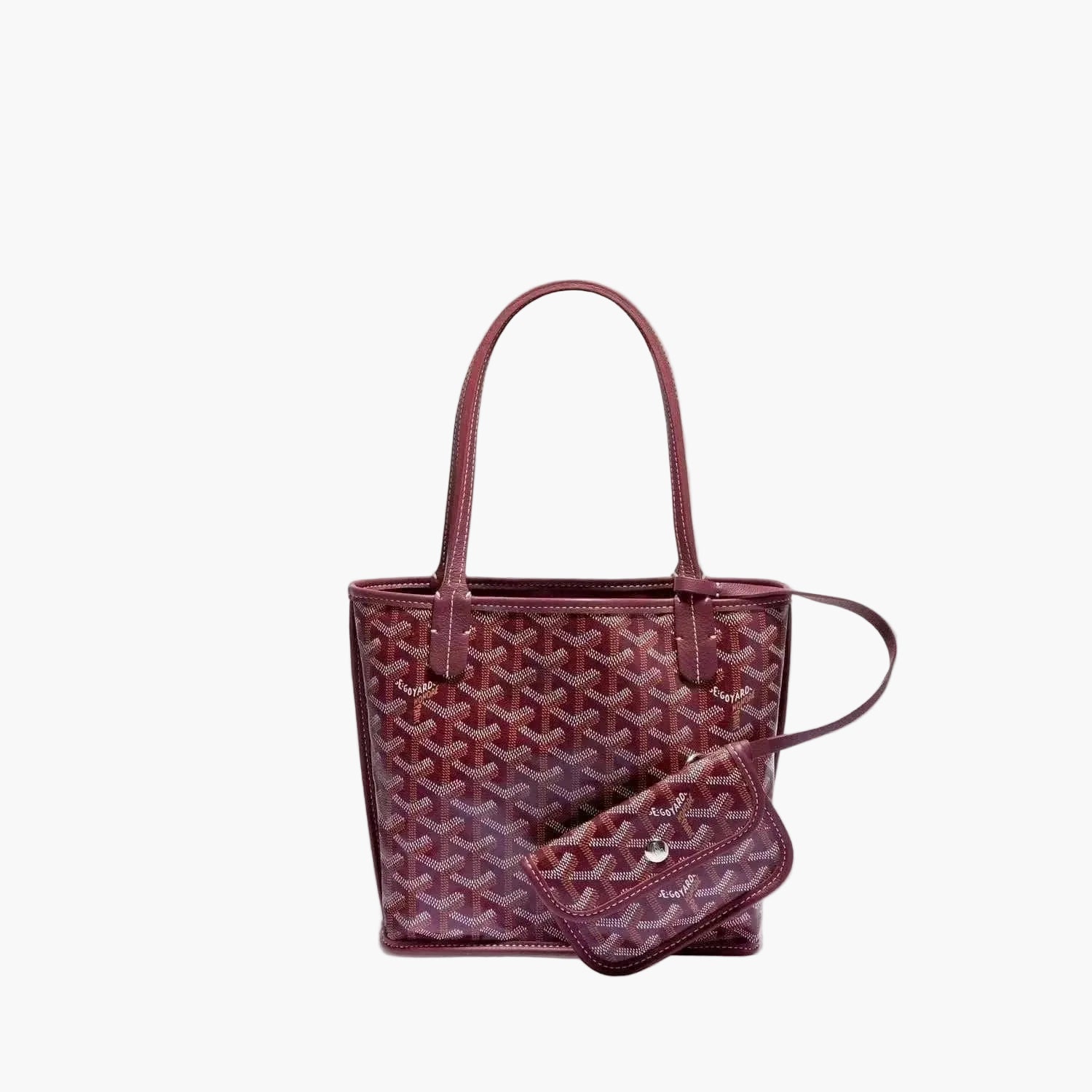 Burgundy geometric patterned mini tote with double handles and detachable pouch