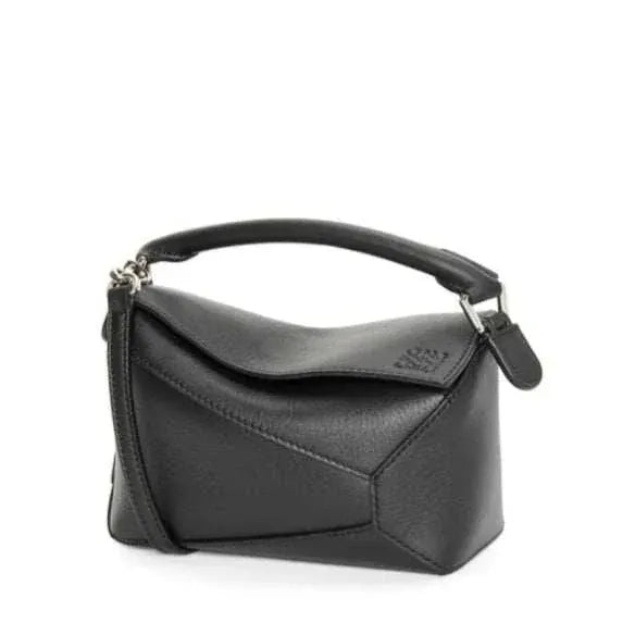 Black Leowyn Puzzle Handbag in premium leather with geometric design and structured silhouette
