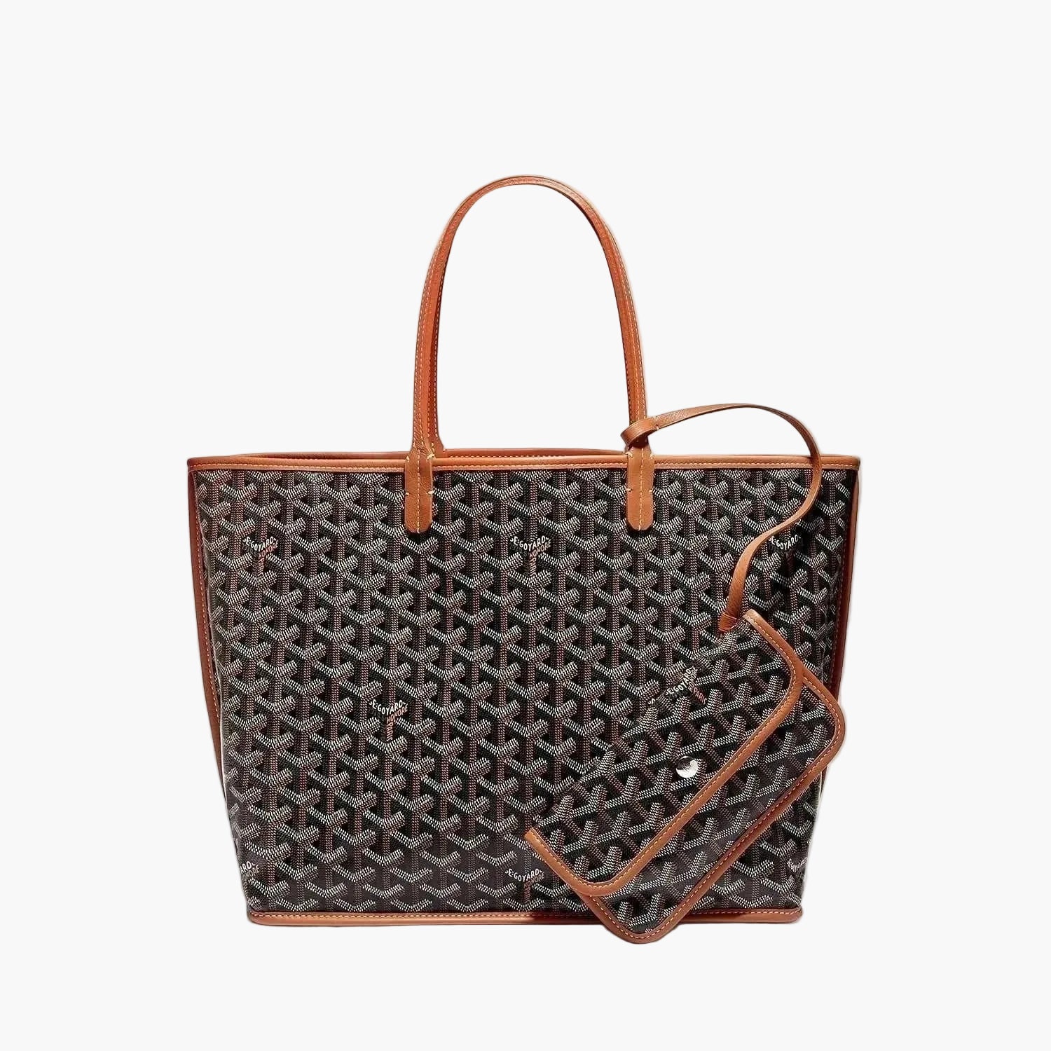 Elegant Élodie Tote Bag with signature patterned finish and detachable pouch for versatile daily use and travel.