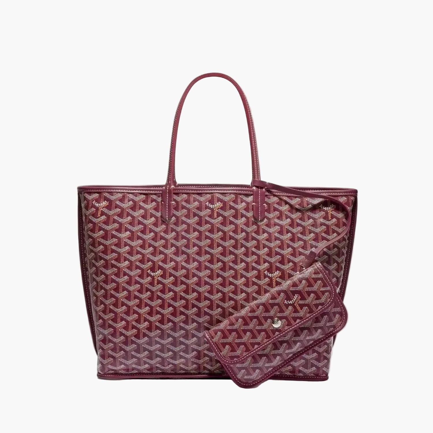 Elegant Élodie tote bag with signature patterned finish and matching detachable pouch in burgundy color